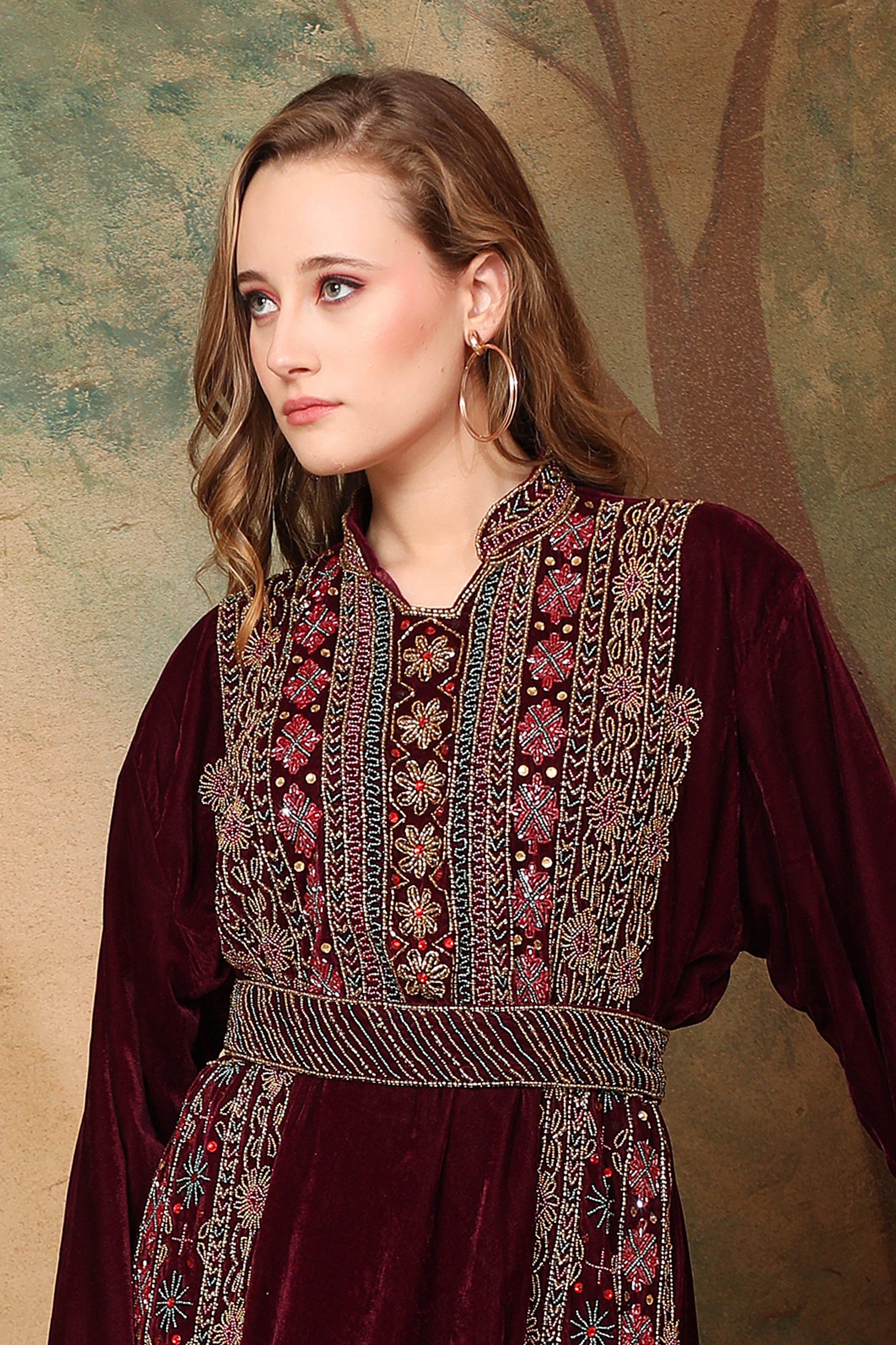 Closeup of Almas Red Velvet Embroidered Gown