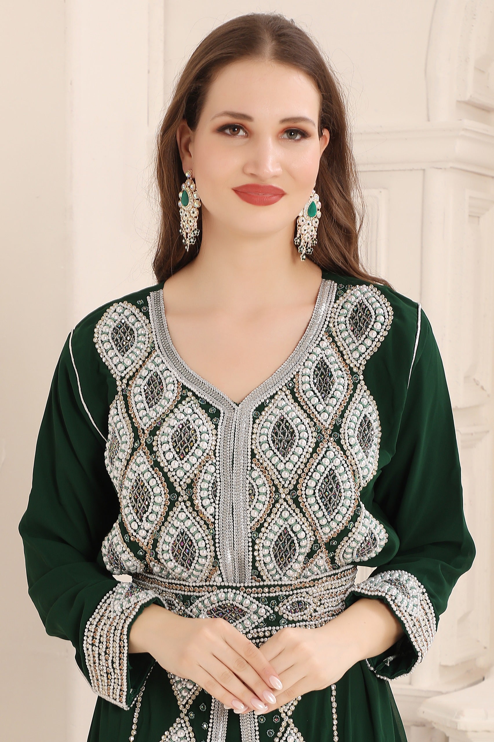 Closeup of Mina Green Moroccan Caftan with Silver Embroidery Work