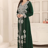 Women wearing Mina Green Moroccan Caftan with Silver Embroidery Work