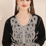 Closeup of Soma Black Moroccan Caftan with Heavy Silver Embroidery
