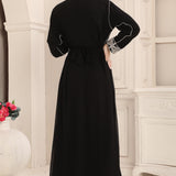 Back of Soma Black Moroccan Caftan with Heavy Silver Embroidery