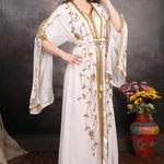 Model wearing Dahab Gold Hand-Embellished Moroccan Caftan, full-length modest luxury outfit.