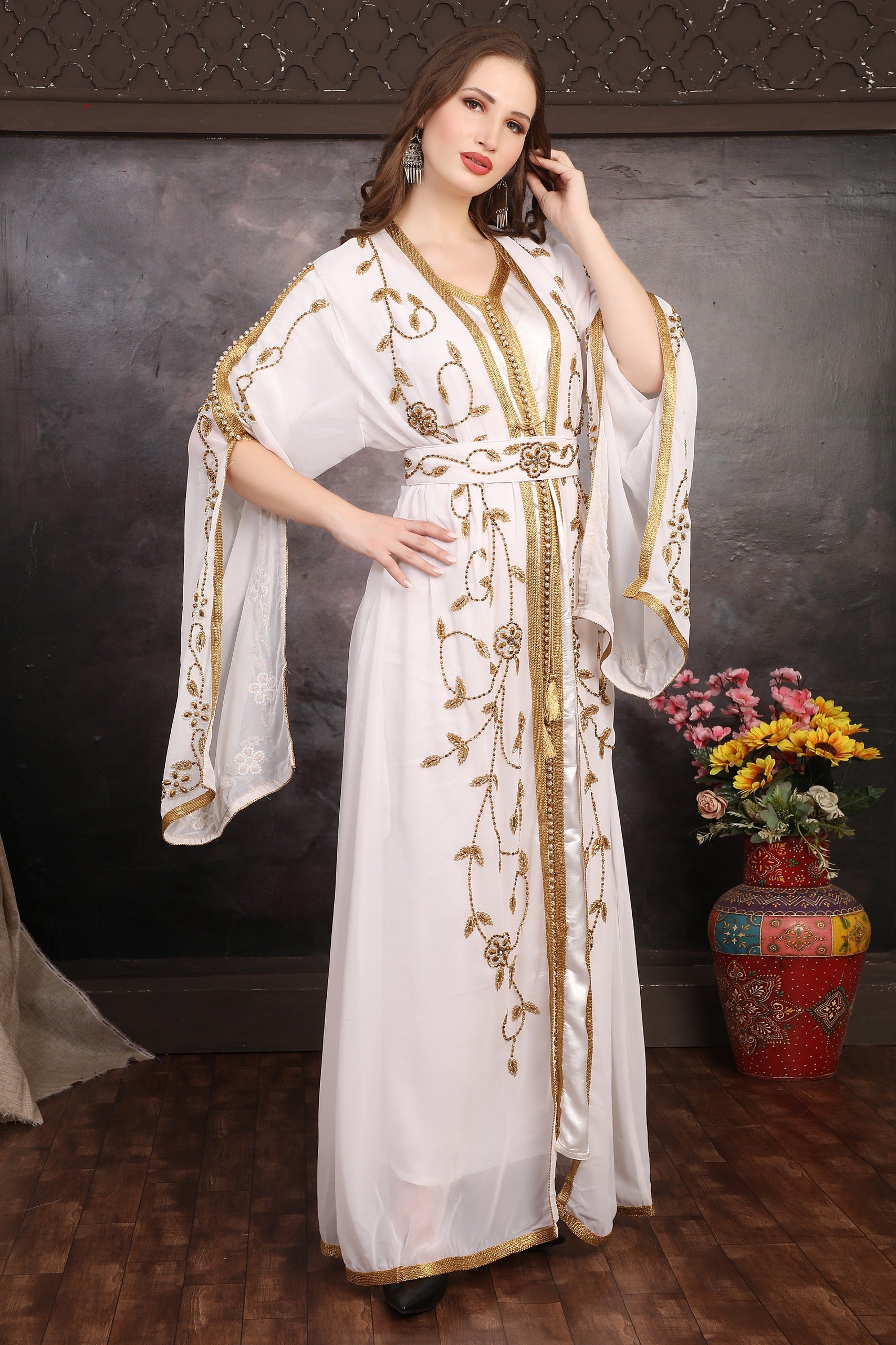 Model wearing Dahab Gold Hand-Embellished Moroccan Caftan, full-length modest luxury outfit.