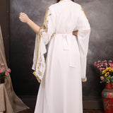 Back view of luxury gold embellished Moroccan caftan dress.